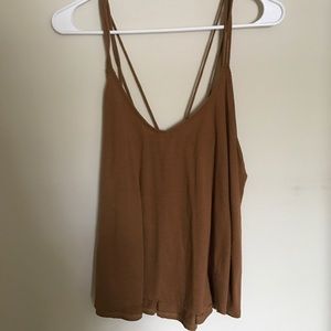 Rust colored strapping and flowy tank